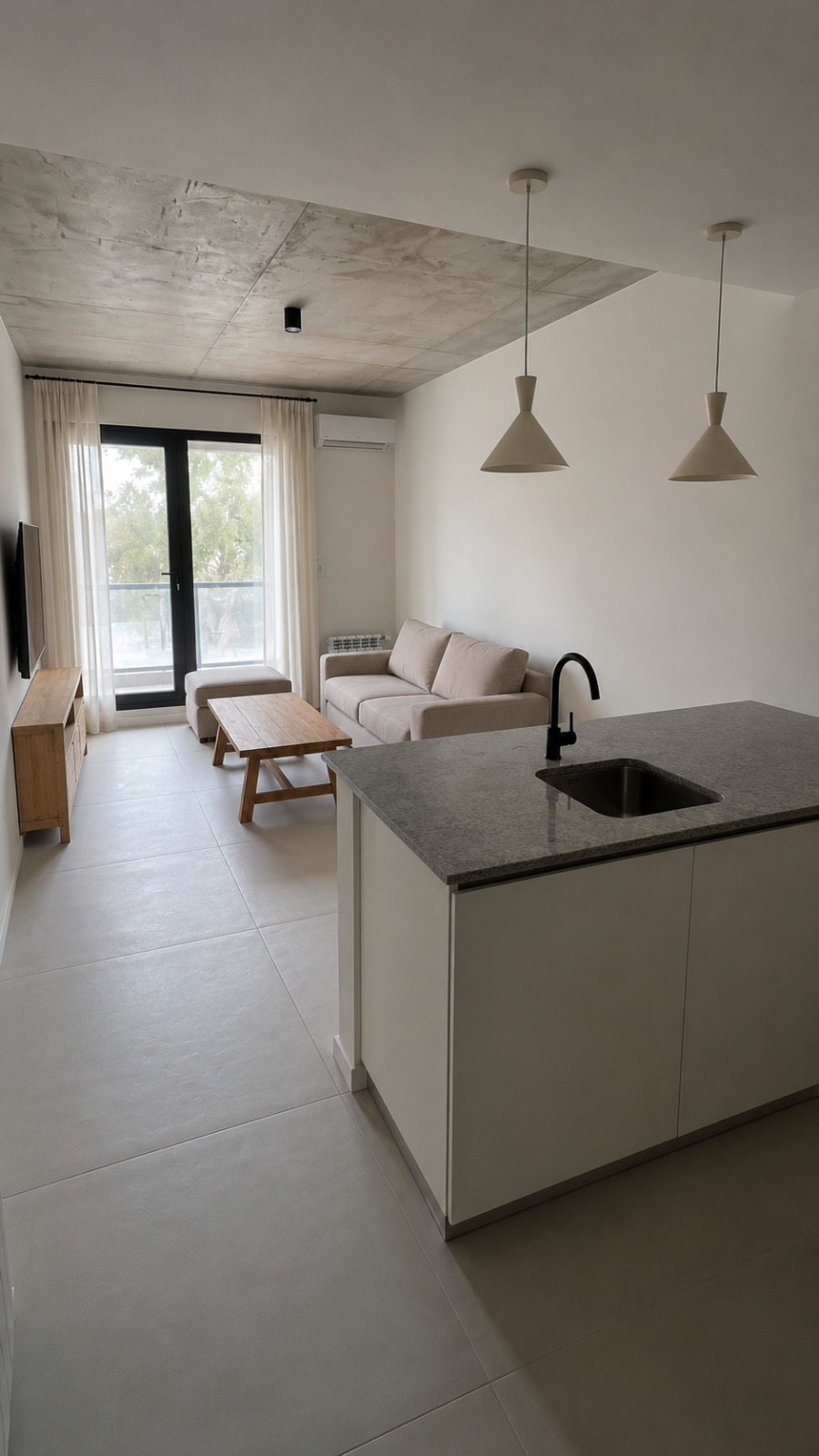 Living y cocina del departamento Gemmulata 1° C, 1 dormitorio en Monte Hermoso